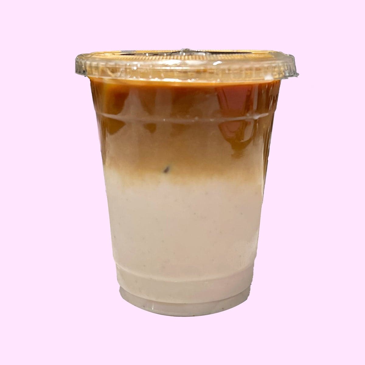 An iced horchata latte in a clear cup