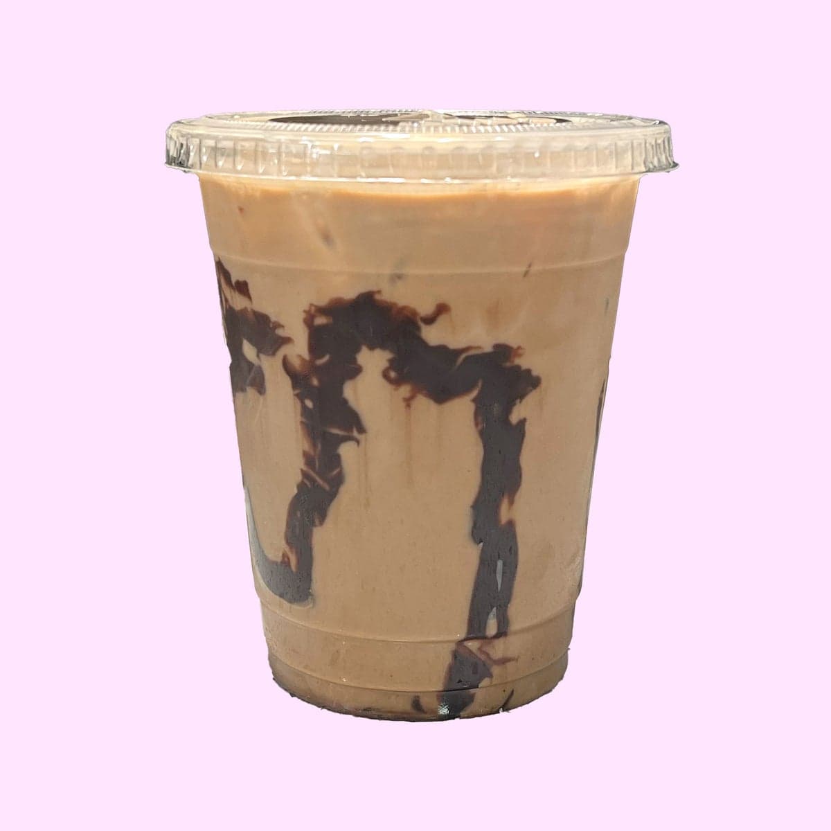 An iced Mexican mocha with chocolate drizzle inside the cup