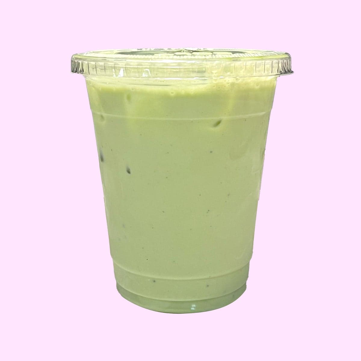 A classic iced matcha latte in a clear cup
